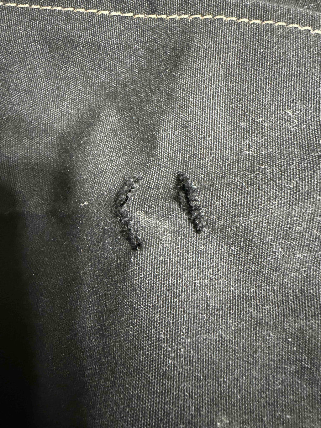 Small tears on cover - before repair