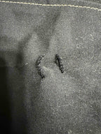Small tears on cover - before repair